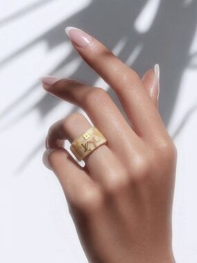 Louis Vuitton Cream Marbled Resin Monogram Band Ring with Gold Accents. Have COA
